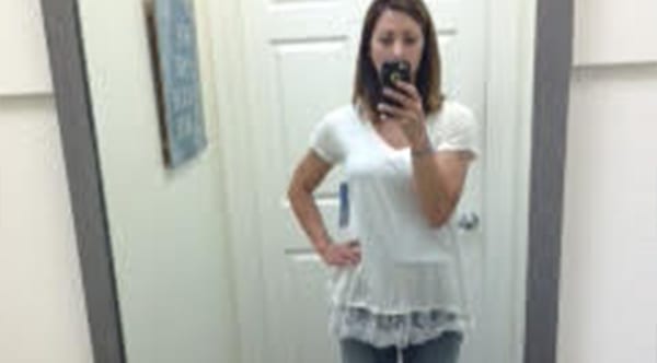 Shauna, a former patient of Dr. Jay Granzow, MD, shows clothes fitting better than ever before after surgery.
